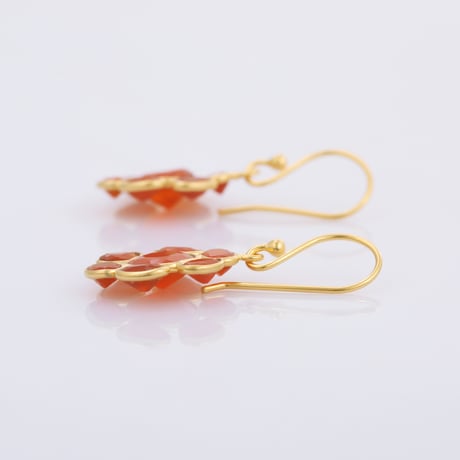 red onyx sun motifピアス