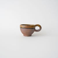 62 壷田亜矢 / コーヒーカップ（あめ釉）丸
