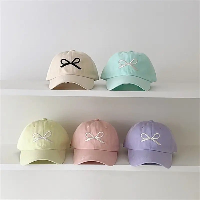 【新品】Emelald Blue　ピンク　兎毛帽子 リボン付 新品】Emelald Blueピンク兎毛帽子 リボン付