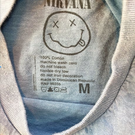 ニルヴァーナ・スマイル ロゴ・Tシャツ (ヘザーインディゴ) (U.S.A. 中古衣料品)