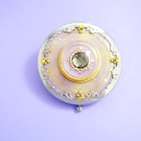 変身コンパクトミラー