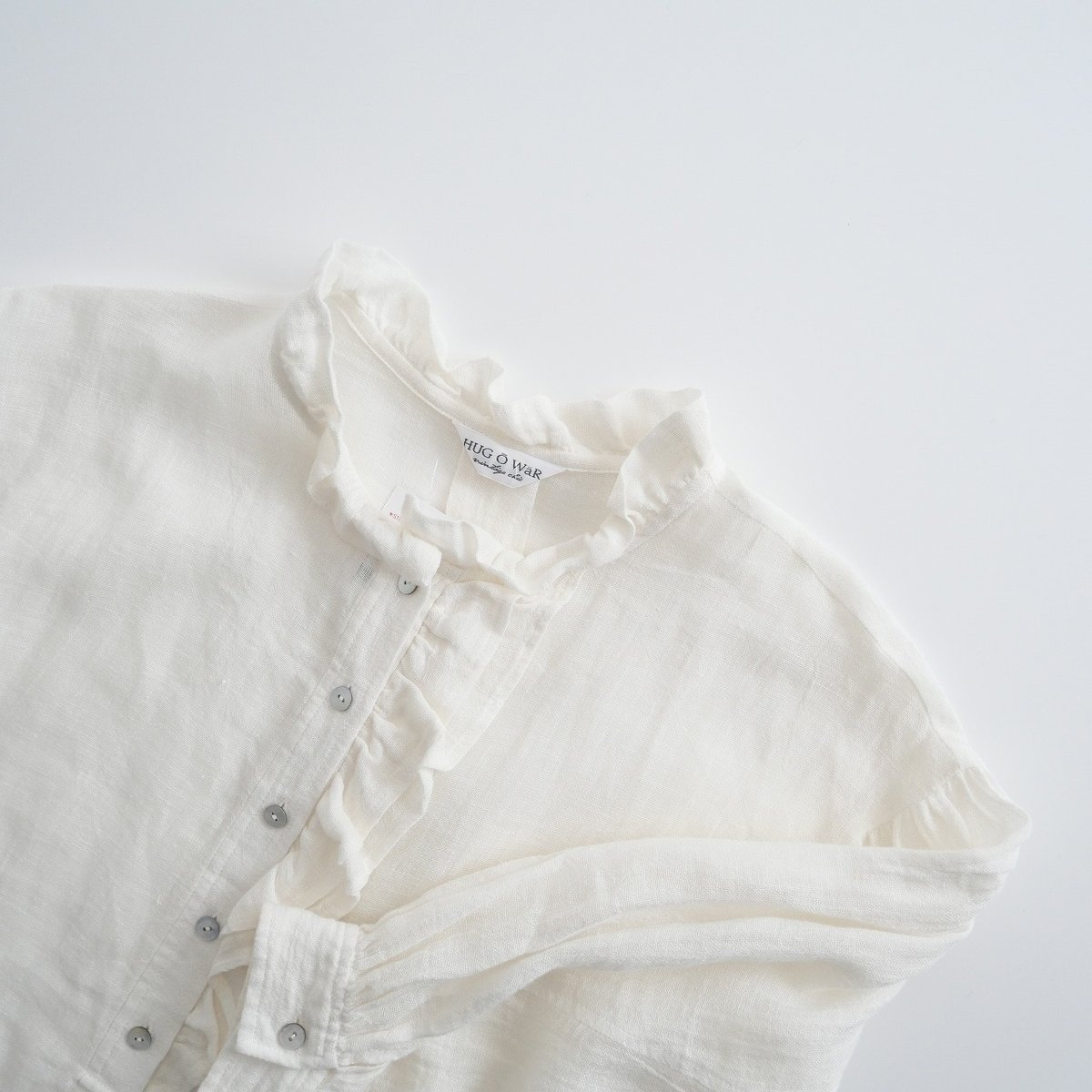 HUG Ō WäR ハグオーワーフリルブラウス