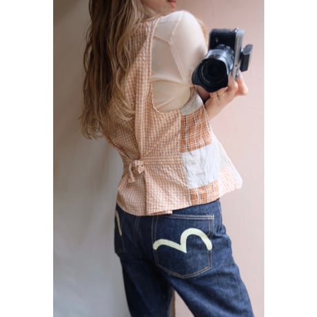orange check vest