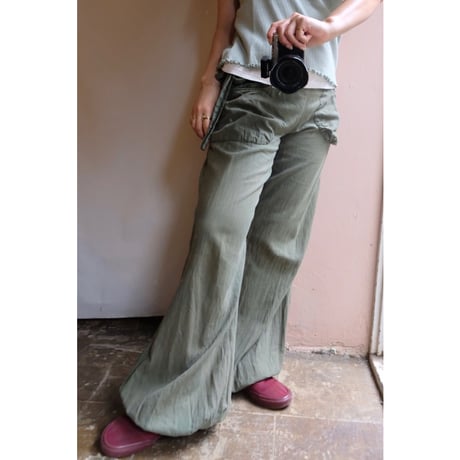 green flare pants