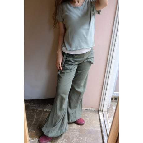 green flare pants