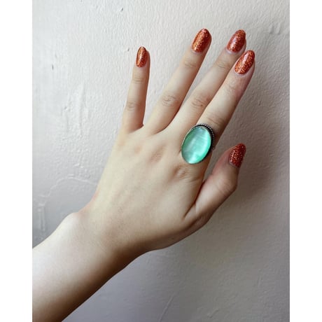 green stone silver ring