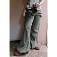 green flare pants