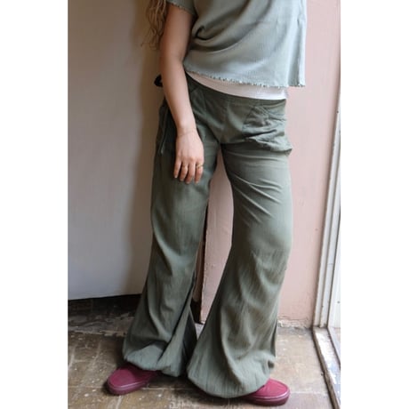 green flare pants