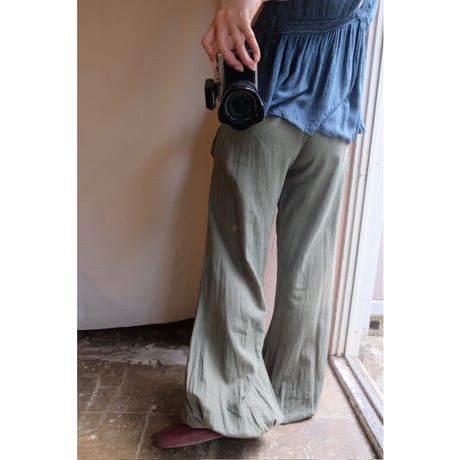 green flare pants