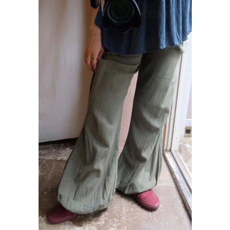 green flare pants