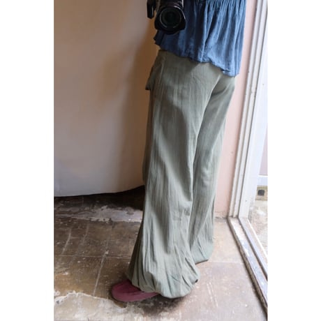 green flare pants