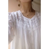 white embroidery one-piece