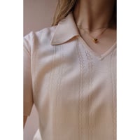 beige knit polo