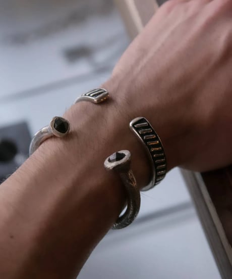 Ferric "Bone cast silver bangle" Memento mori.