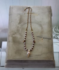 μ "Hawkeye Garnet×Freshwater Pearl"