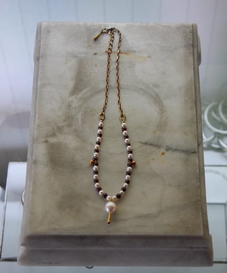 μ "Hawkeye Garnet×Freshwater Pearl"