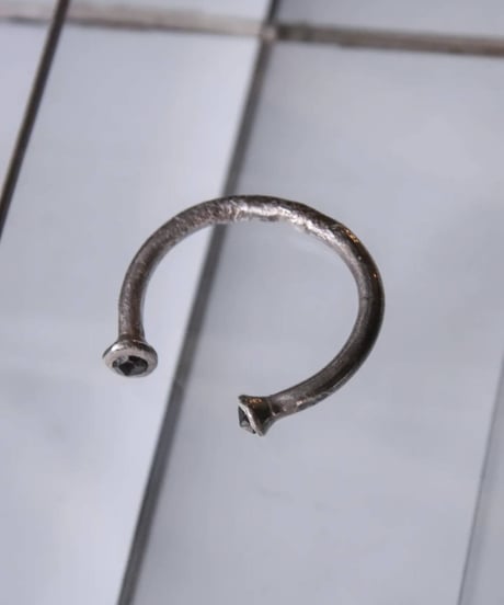 Ferric "Bone cast silver bangle" Memento mori.