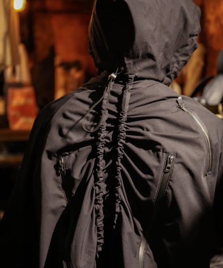 NL "Turning tech poncho"