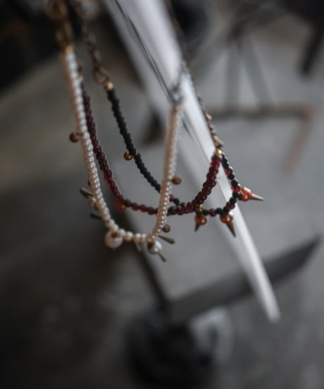 μ "Black and red glasses studs"