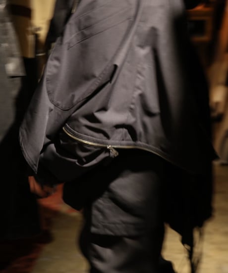 NL "Turning tech poncho"
