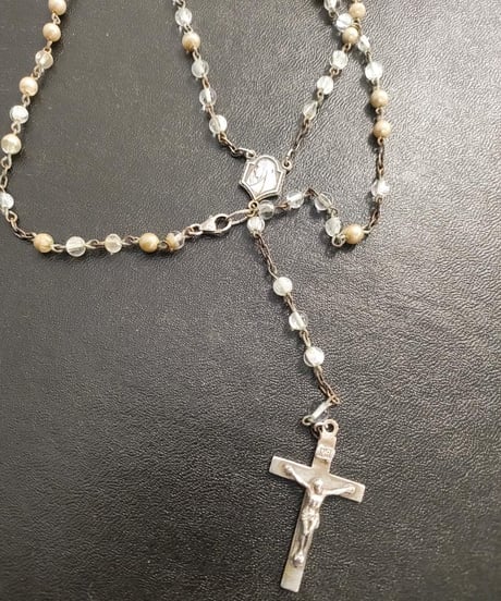 Subtle "Jesus christ" Beige glass skeleton glass.
