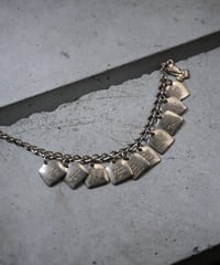 Subtle "Christian bracelet" Ensemble.