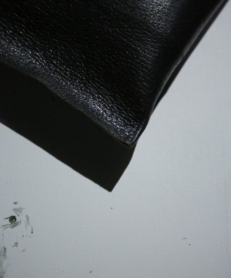 JFR "Square curve leather clutch bag"