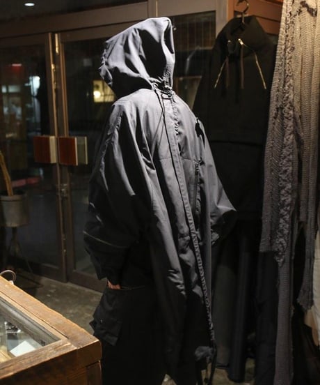 NL "Turning tech poncho"