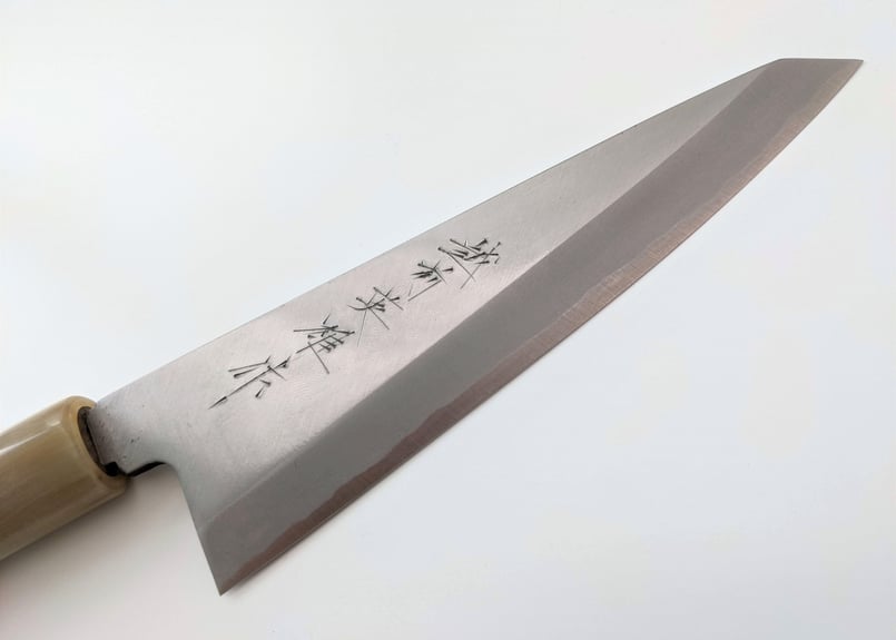 旭峰作尺1寸布袋 高岡銅器です。透き漆仕上げをしてい