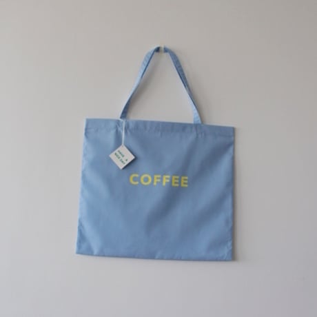 cafe shimaのオリジナルのカバン　  水色生地×黄色ロゴ文字
