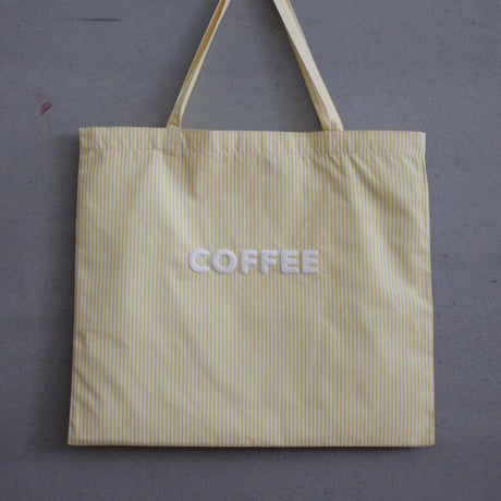 cafe shimaのオリジナルのカバン　黄色ストライプ生地　×  白色ロゴ文字