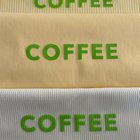 cafe shimaのオリジナルのカバン　白コーディロイ太畝生地　×  グリーン色ロゴ文字