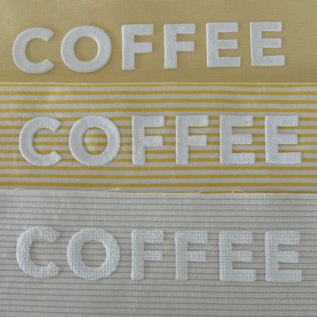 cafe shimaのオリジナルのカバン　黄色ストライプ生地　×  白色ロゴ文字