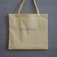 cafe shimaのオリジナルのカバン　　黄色生地　×   グレーロゴ文字
