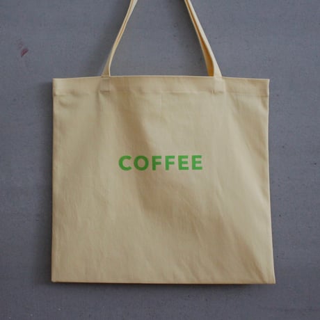 cafe shimaのオリジナルのカバン　黄色生地　×  グリーンロゴ文字