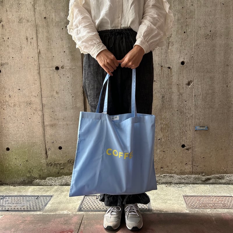 cafe shimaのオリジナルのカバン 水色生地×黄色ロゴ文字 | cafe