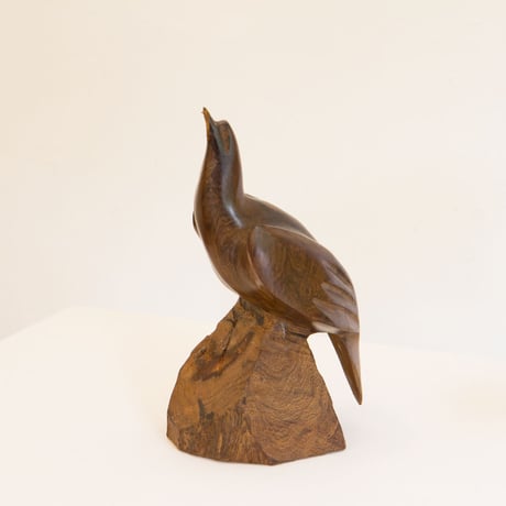 Wooden bird sculpture