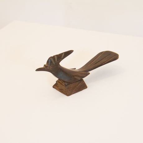 Wooden bird sculpture