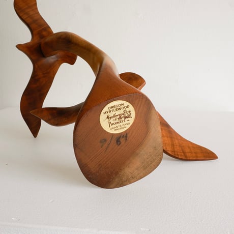 Wooden bird sculpture