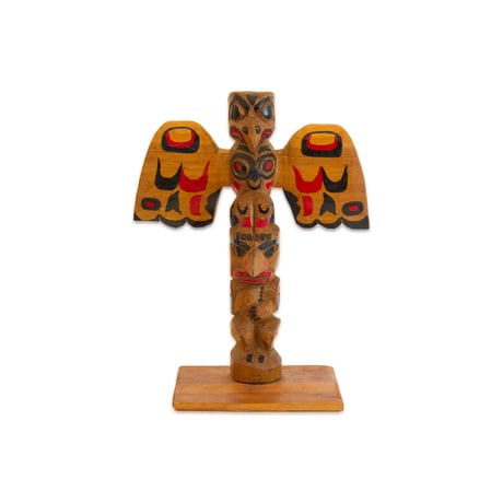 Hand carved totem pole