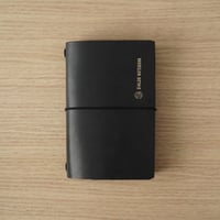 つつむレザーノートカバー（ダブルオイルアンティークヌメ革・ブラック）DNC009
