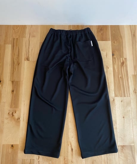 MANUAL ALPHABET マニュアルアルファベット（ユニセックス）/ SMOOTH JERSEY WIDE TRUCK PANTS スムースジャージートラックワイドパンツ【ブラック】