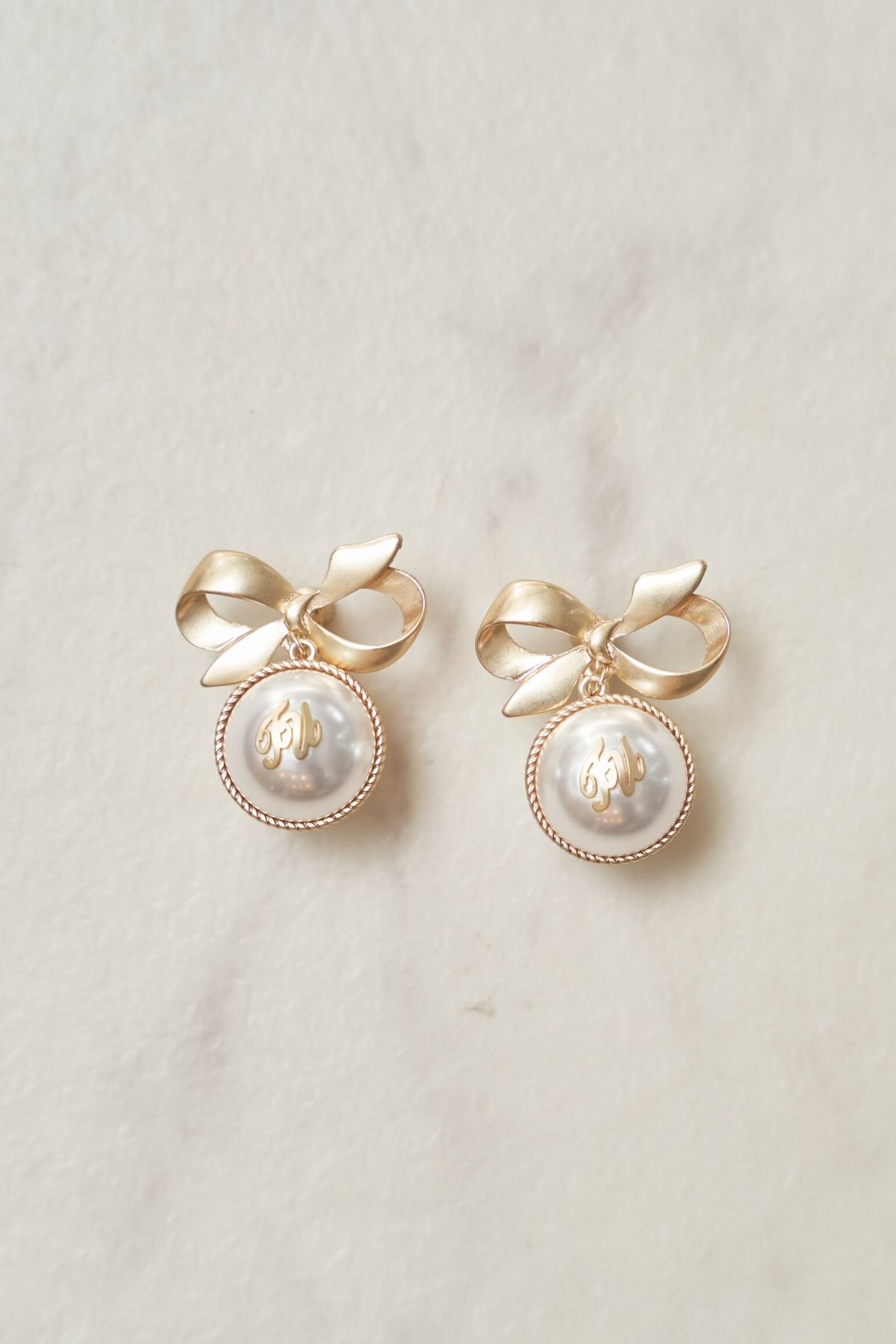 Tü original ribbon pearl ear ring /piece | Tre...