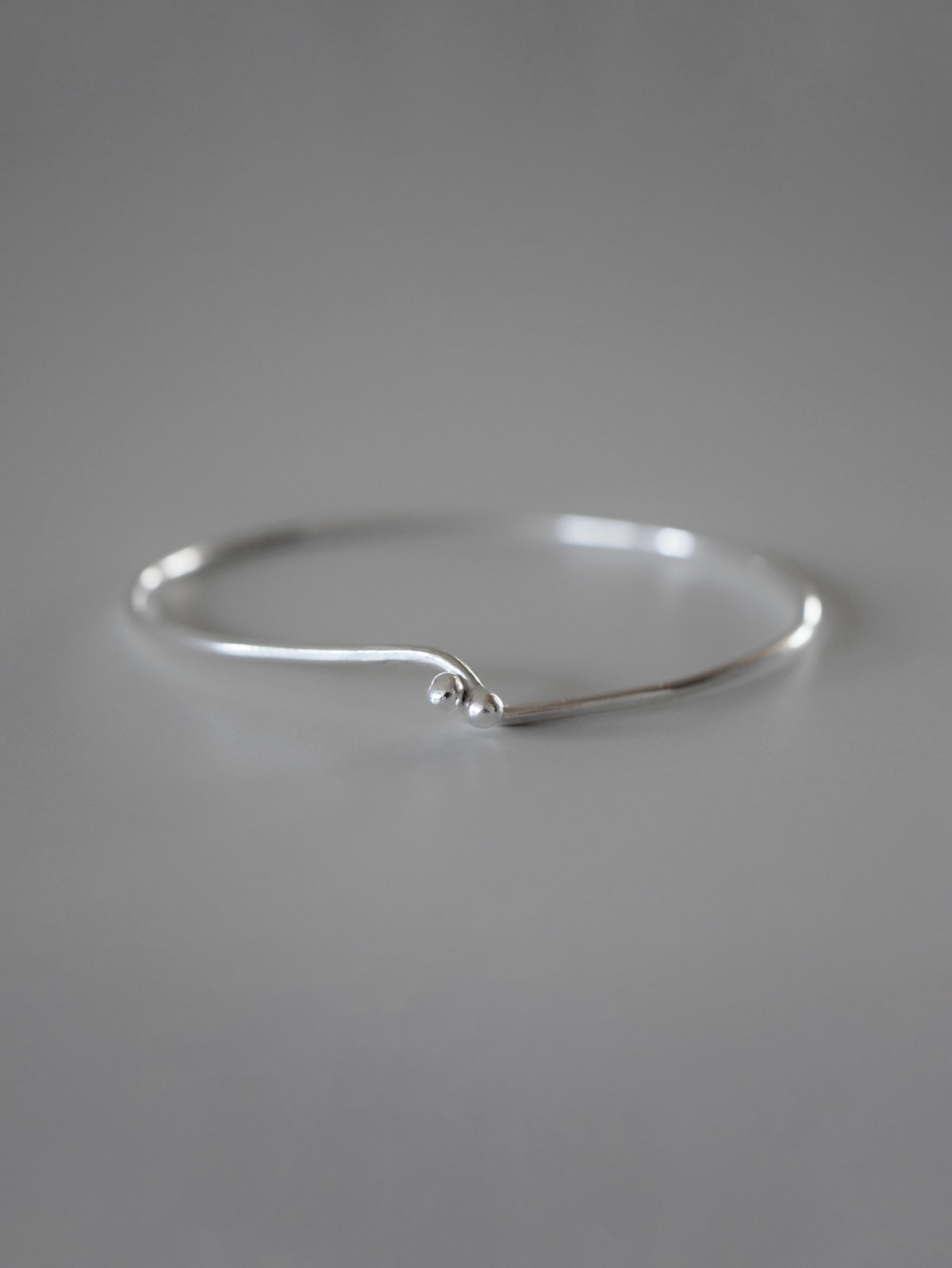 click bangle (silver) | ayano otsubo