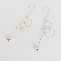 メタルサークルチャームラップピアス