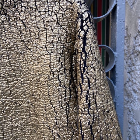gold and black jumper