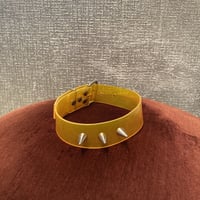 yellow PVC choker 3 spikes