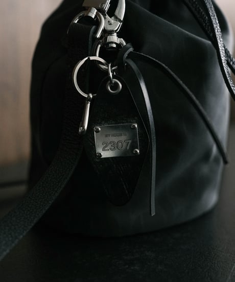 #01 LUXURY MATERIAL DRAWSTRING BAG by LIMONTA