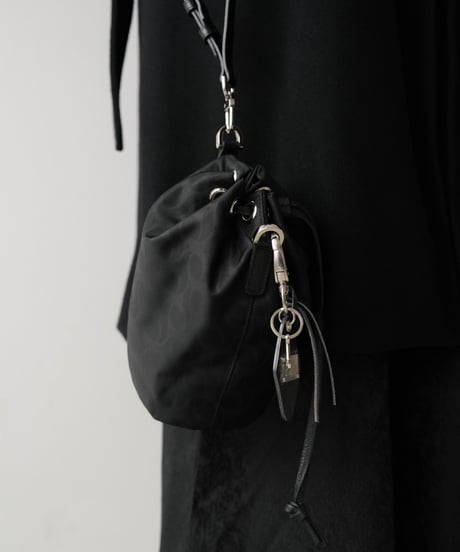 #01 LUXURY MATERIAL DRAWSTRING BAG by LIMONTA