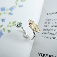 ホシベッコウカギバとリボンのリング(真鍮×シルバー・ブルーグリーンアパタイト)【受注制作 1ヶ月以内に発送】